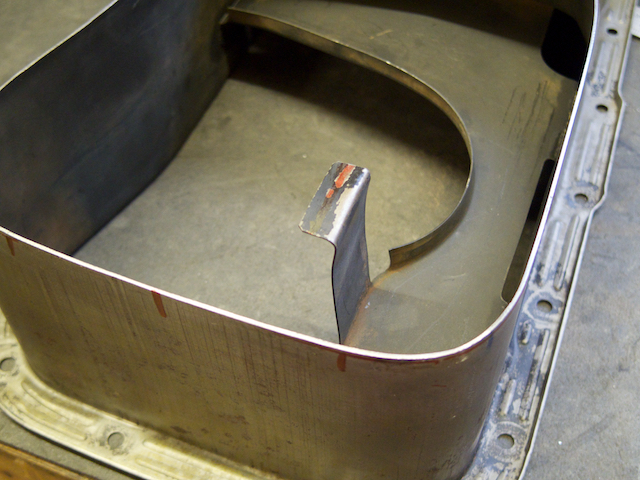 Shortening the baffle support. This was actually bent form all the sump damage