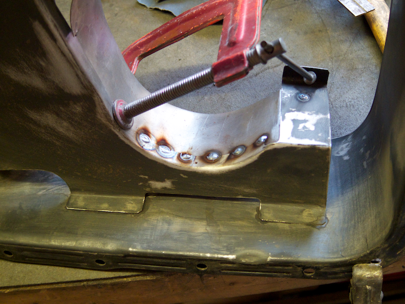 Tacking the vertical baffle extension in place