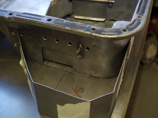 Threaded plate tacked in place